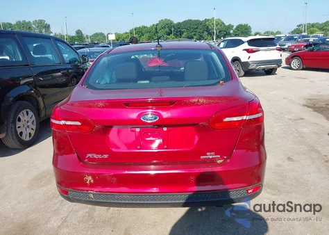 2015 Ford Focus Se z USA, uszkodzony, nr VIN 1FADP3F23FL340120